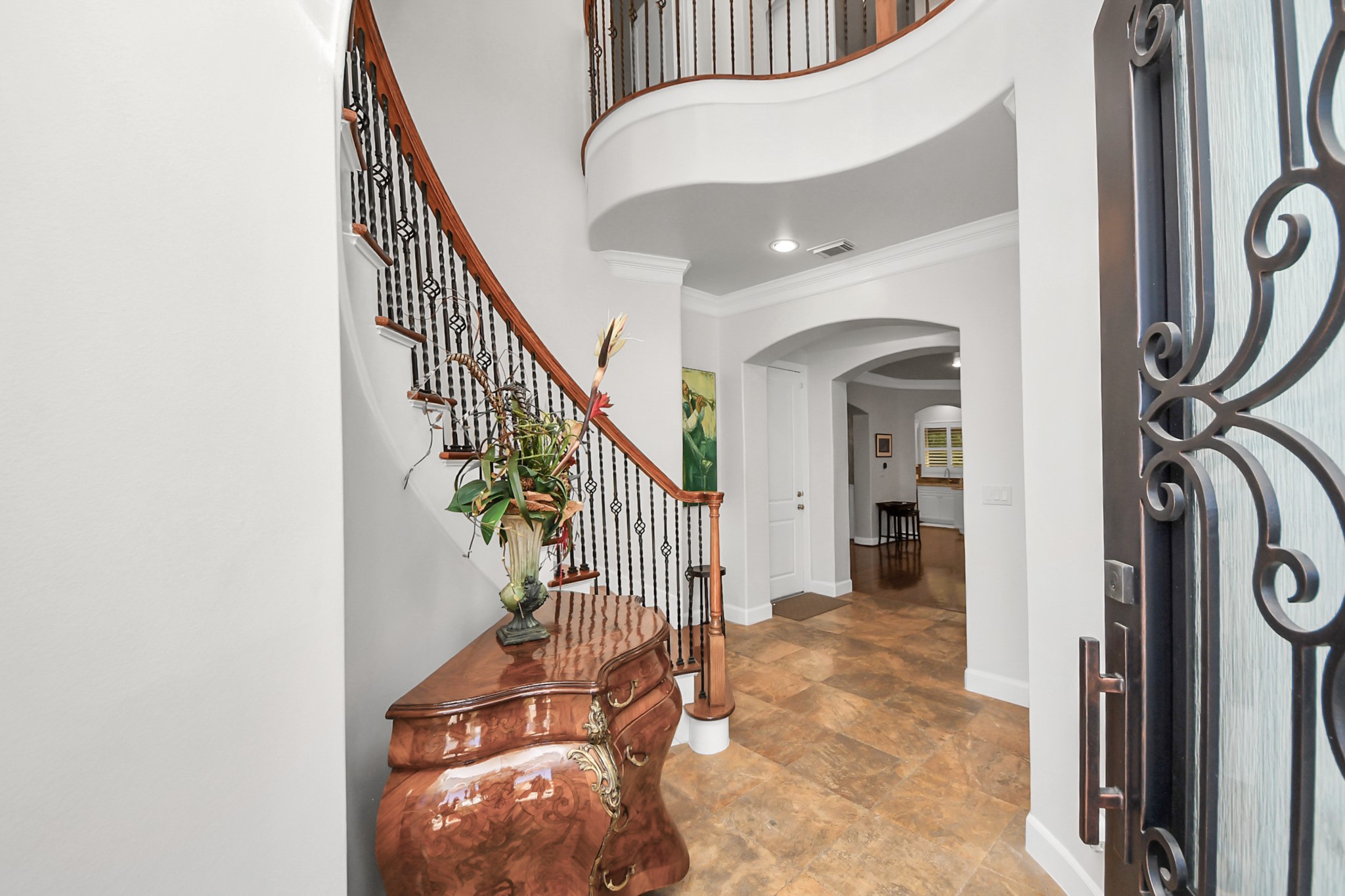 6302 Hermann Lake Drive Houston, TX 77021 - Photo 6 of 50 Upon entering, you’re welcomed by a breathtaking rotunda foyer that immediately sets the tone for the home’s elegant design. Can you imagine greeting guests in such a stunning entrance?