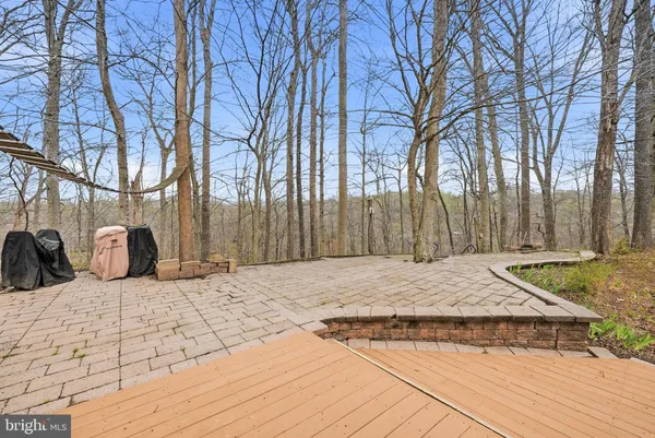 a view of a backyard of the house