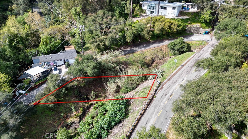 0 Cave Way Topanga, CA 90290 - Photo 2 of 14 an aerial view of residential house with outdoor space and trees all around