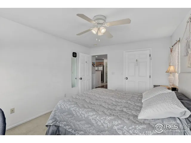 a very nice looking room with a ceiling fan