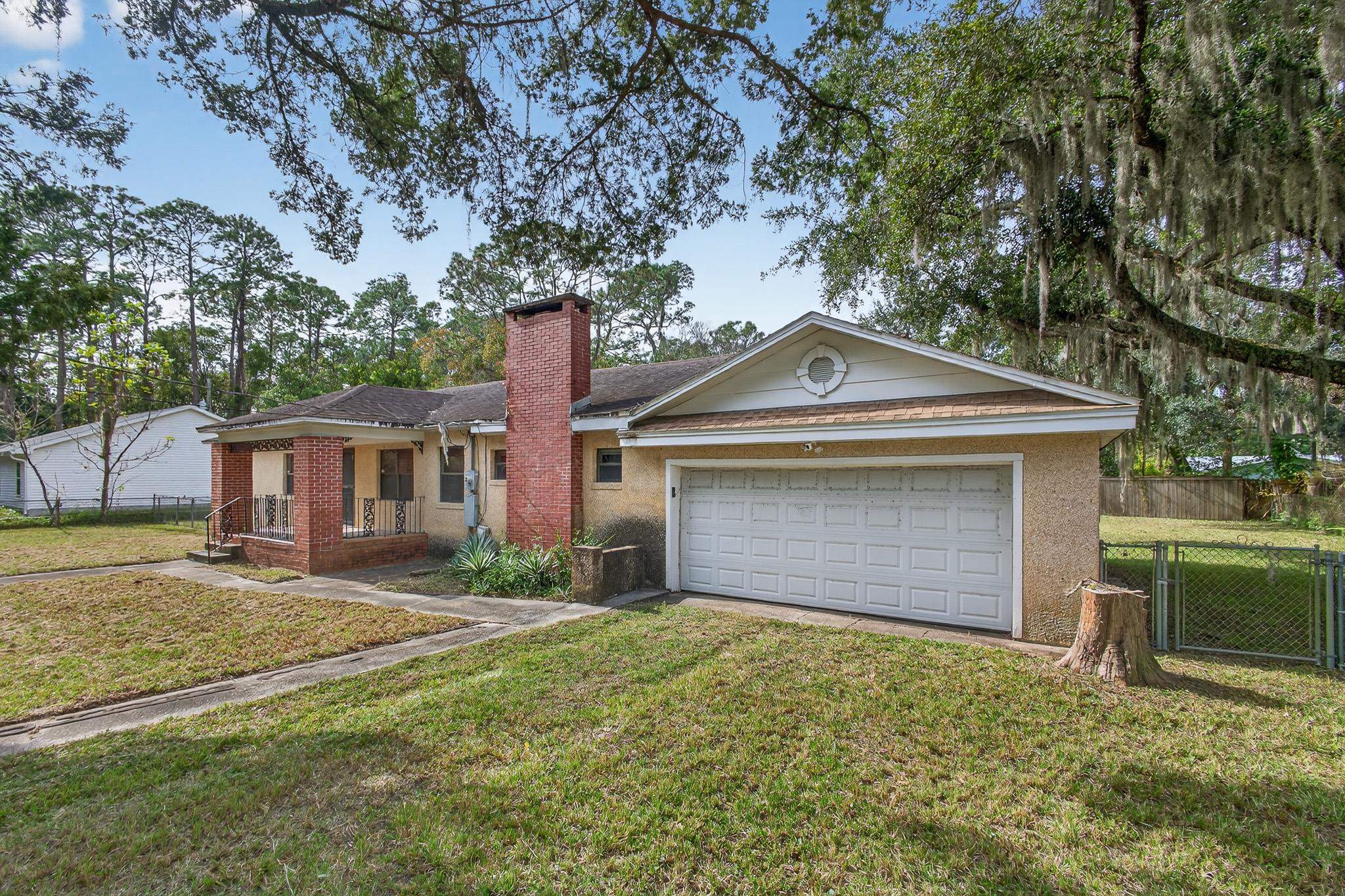 2907 North 5th Street St. Augustine, FL 32084 - Photo 1 of 71 Single story home featuring a chimney and brick siding