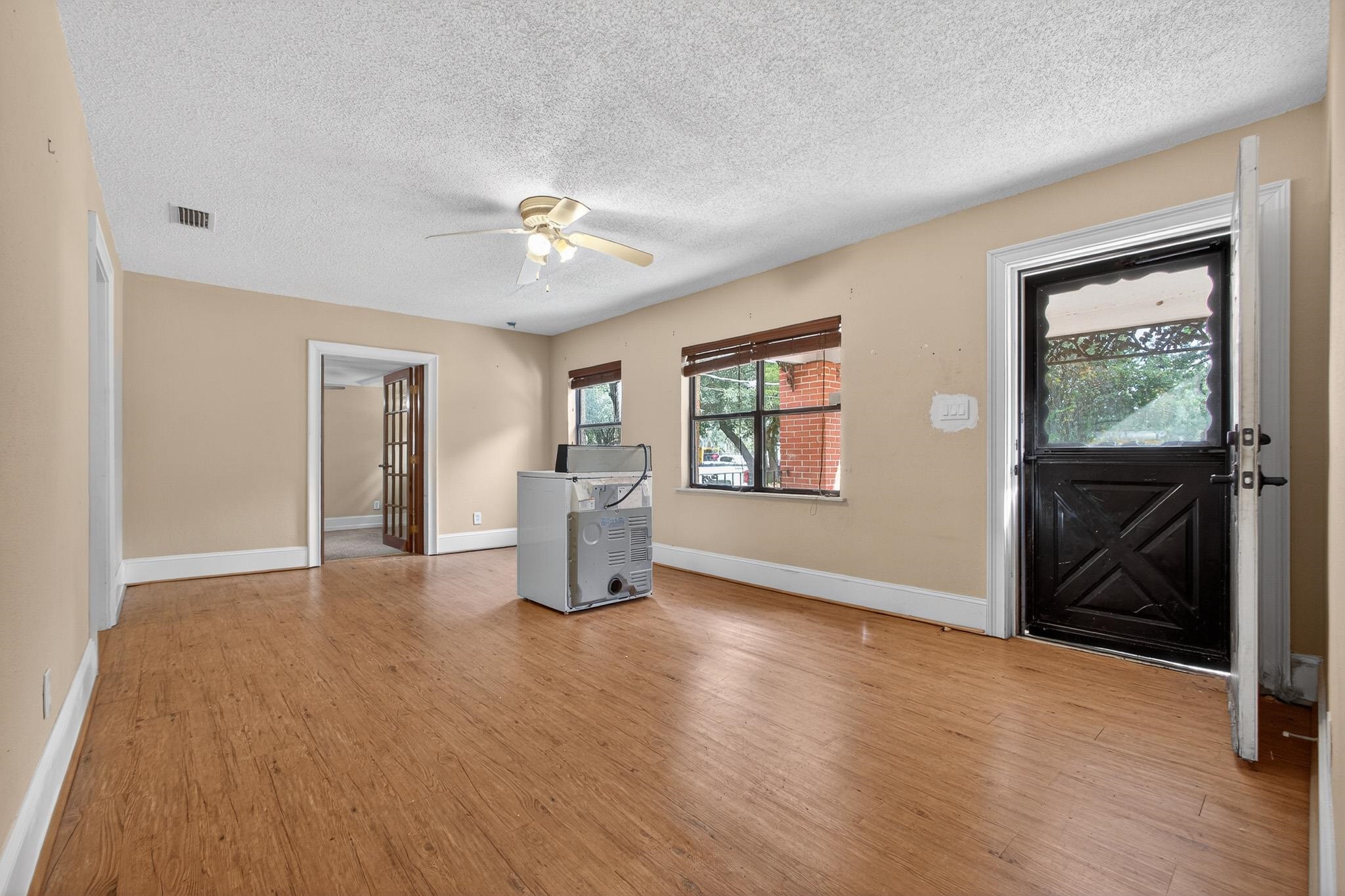 2907 North 5th Street St. Augustine, FL 32084 - Photo 28 of 71 Foyer with a textured ceiling, light wood-type flooring, and ceiling fan