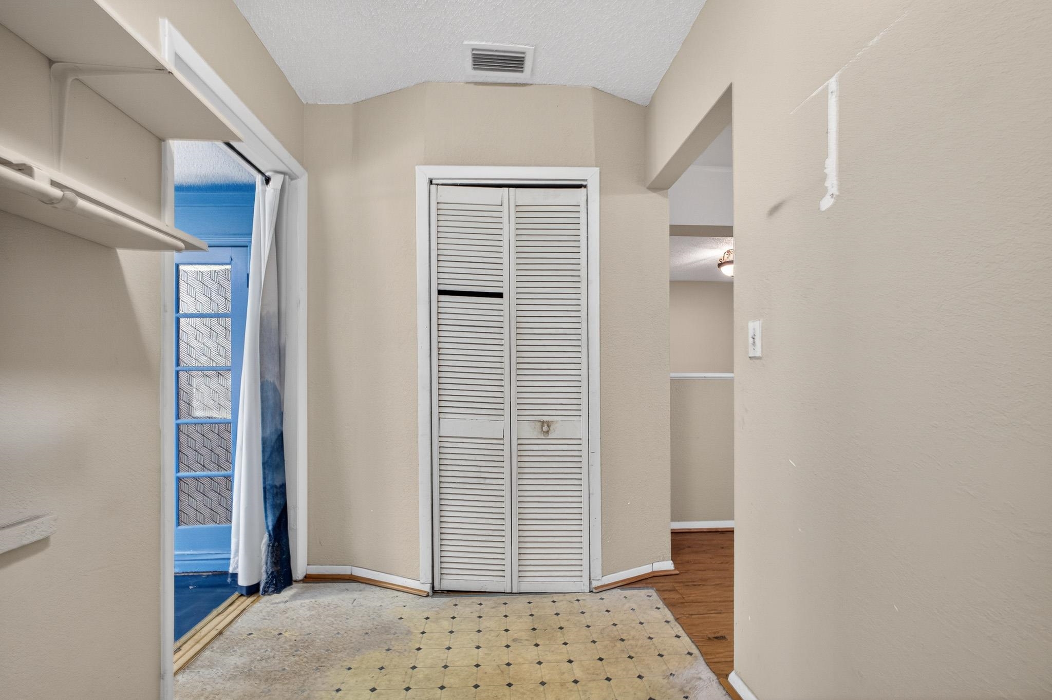 2907 North 5th Street St. Augustine, FL 32084 - Photo 37 of 71 Corridor featuring baseboards and a textured ceiling