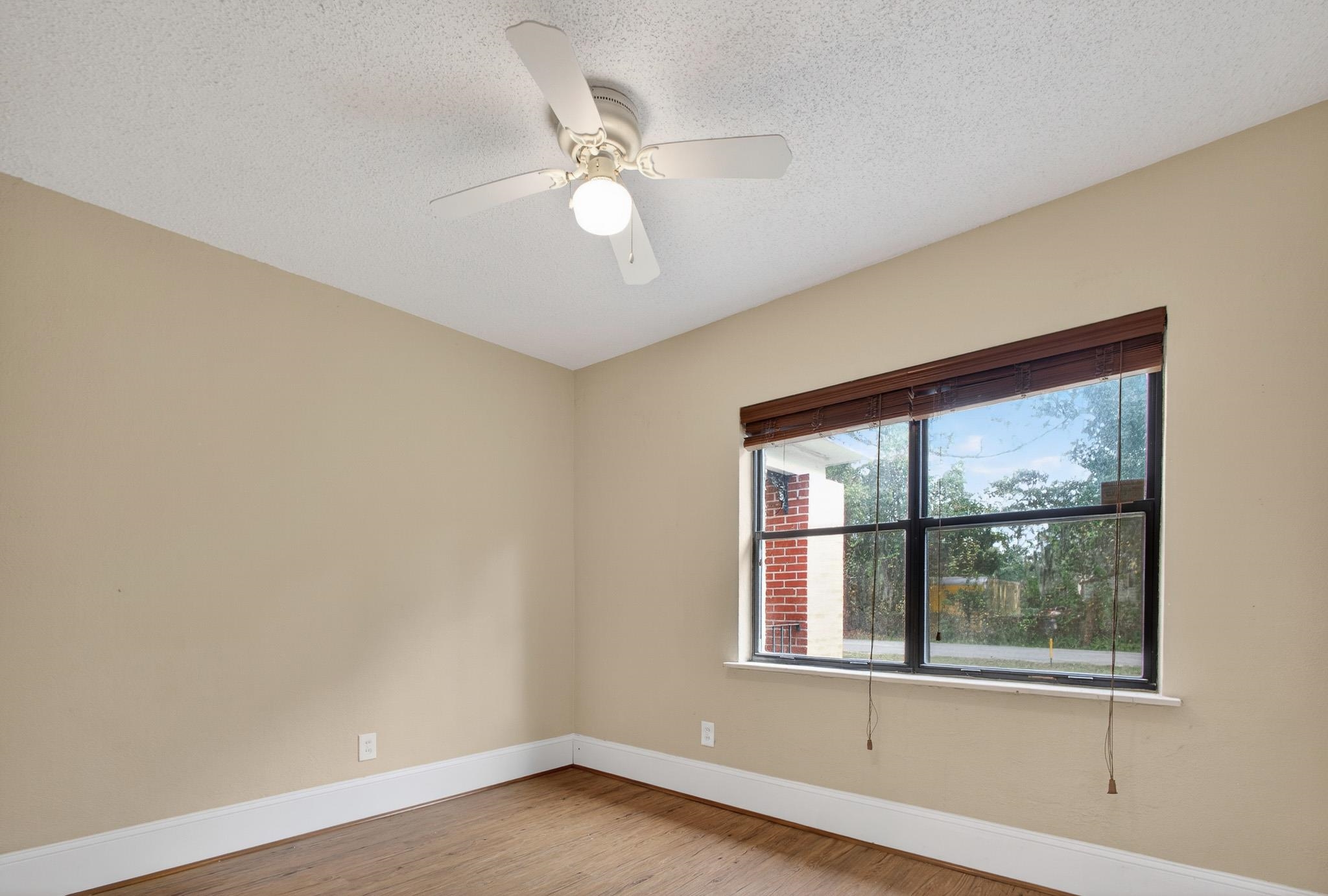 2907 North 5th Street St. Augustine, FL 32084 - Photo 46 of 71 Spare room featuring light wood finished floors, a ceiling fan, and a textured ceiling