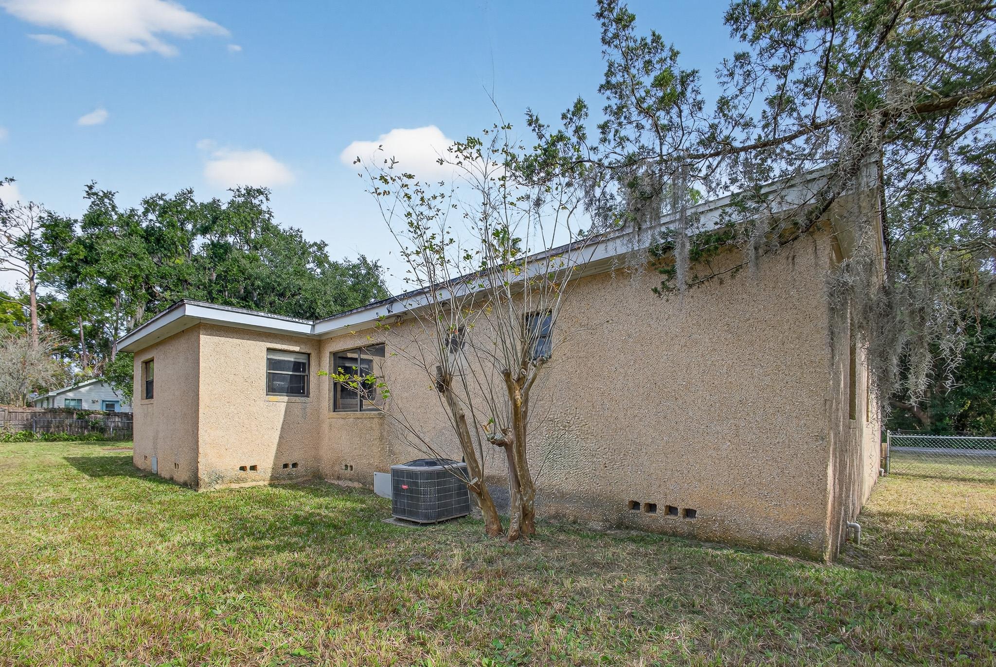 2907 North 5th Street St. Augustine, FL 32084 - Photo 59 of 71 View of side of property with crawl space and stucco siding