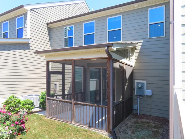 a view of a house with a small porch
