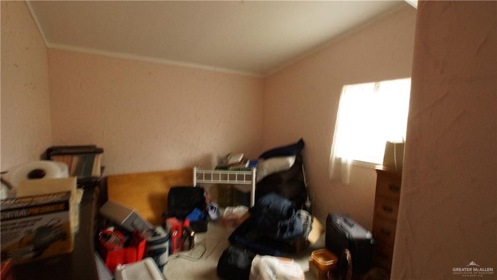 29833 Fernando East Road Rio Hondo, TX 78583 - Photo 11 of 15 a living room with furniture and a fireplace