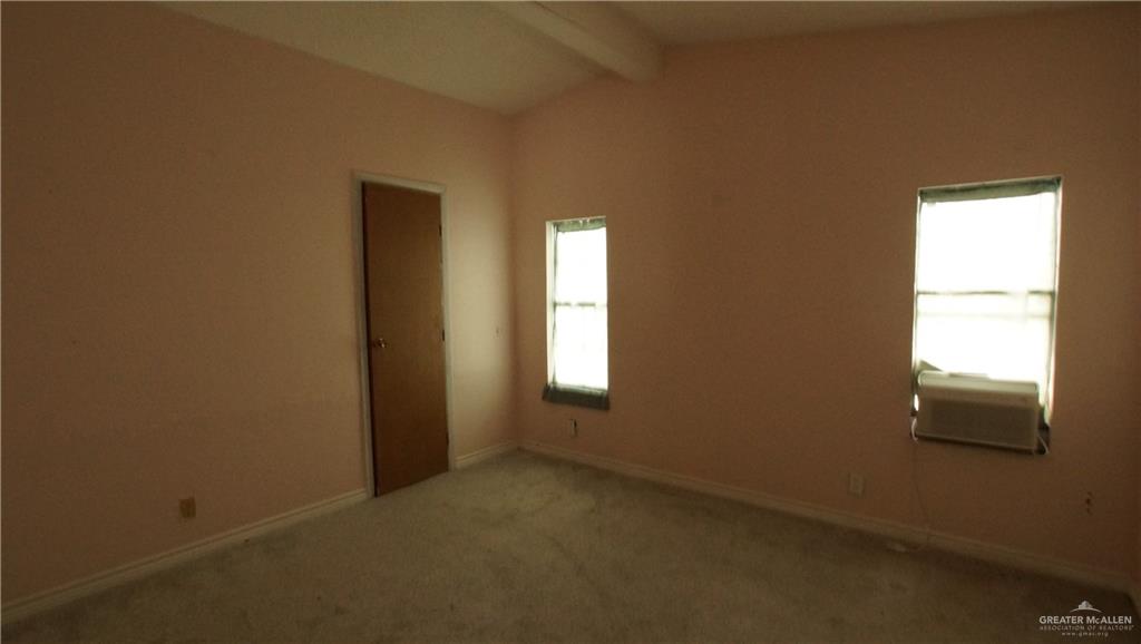 29833 Fernando East Road Rio Hondo, TX 78583 - Photo 13 of 15 an empty room with windows