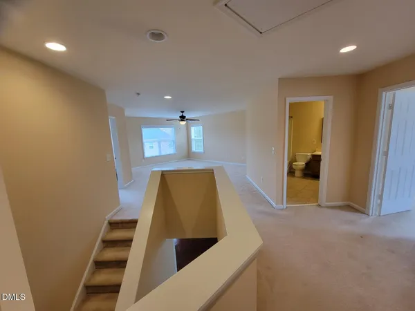 a view of kitchen and wooden floor