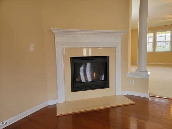 a living room with a fireplace