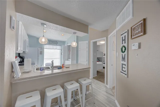 a bathroom with a sink double vanity and shower