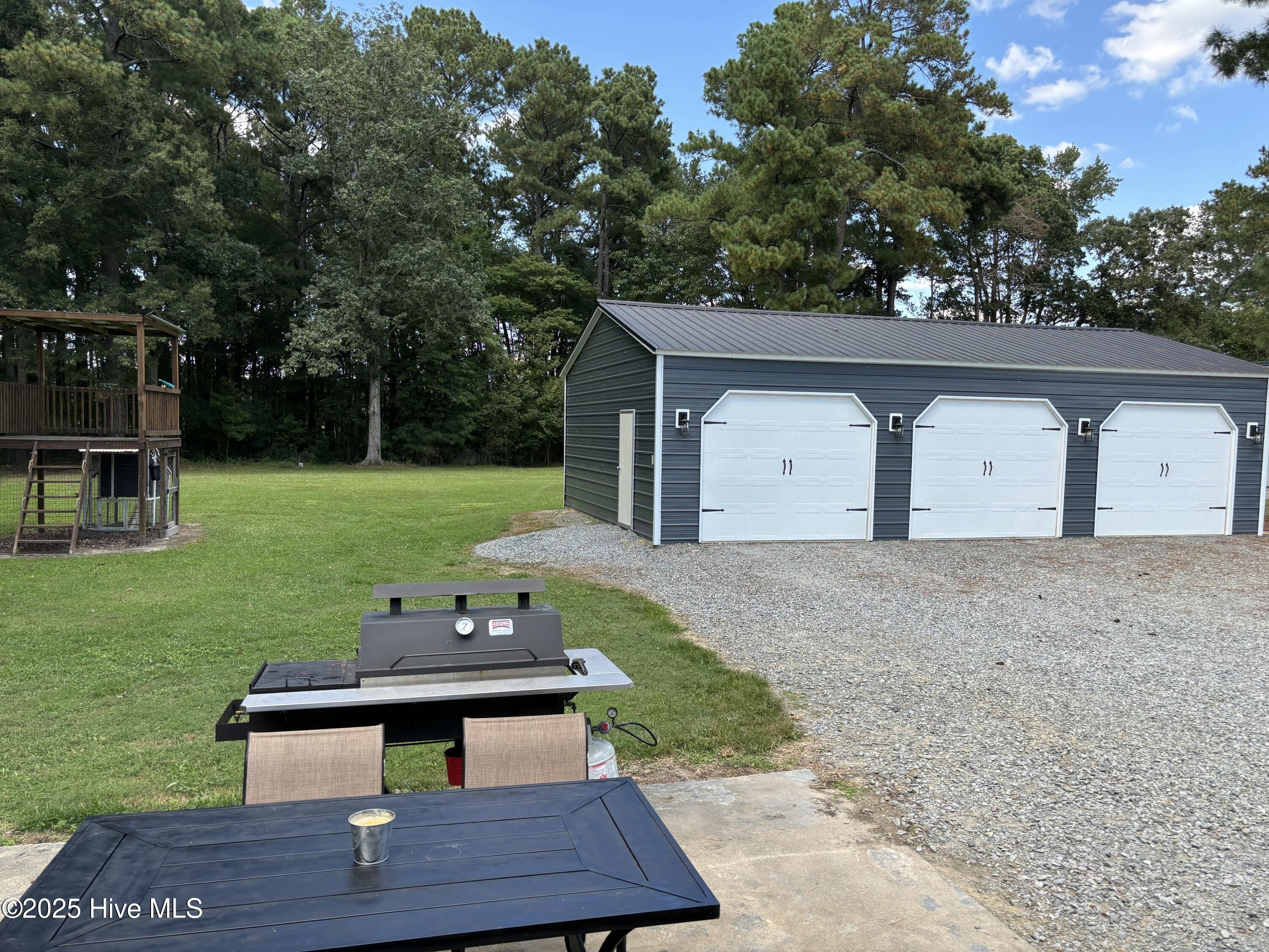 613 Doolittle Mill Road Conway, NC 27820 - Photo 51 of 63 Back door view to 3 car garage