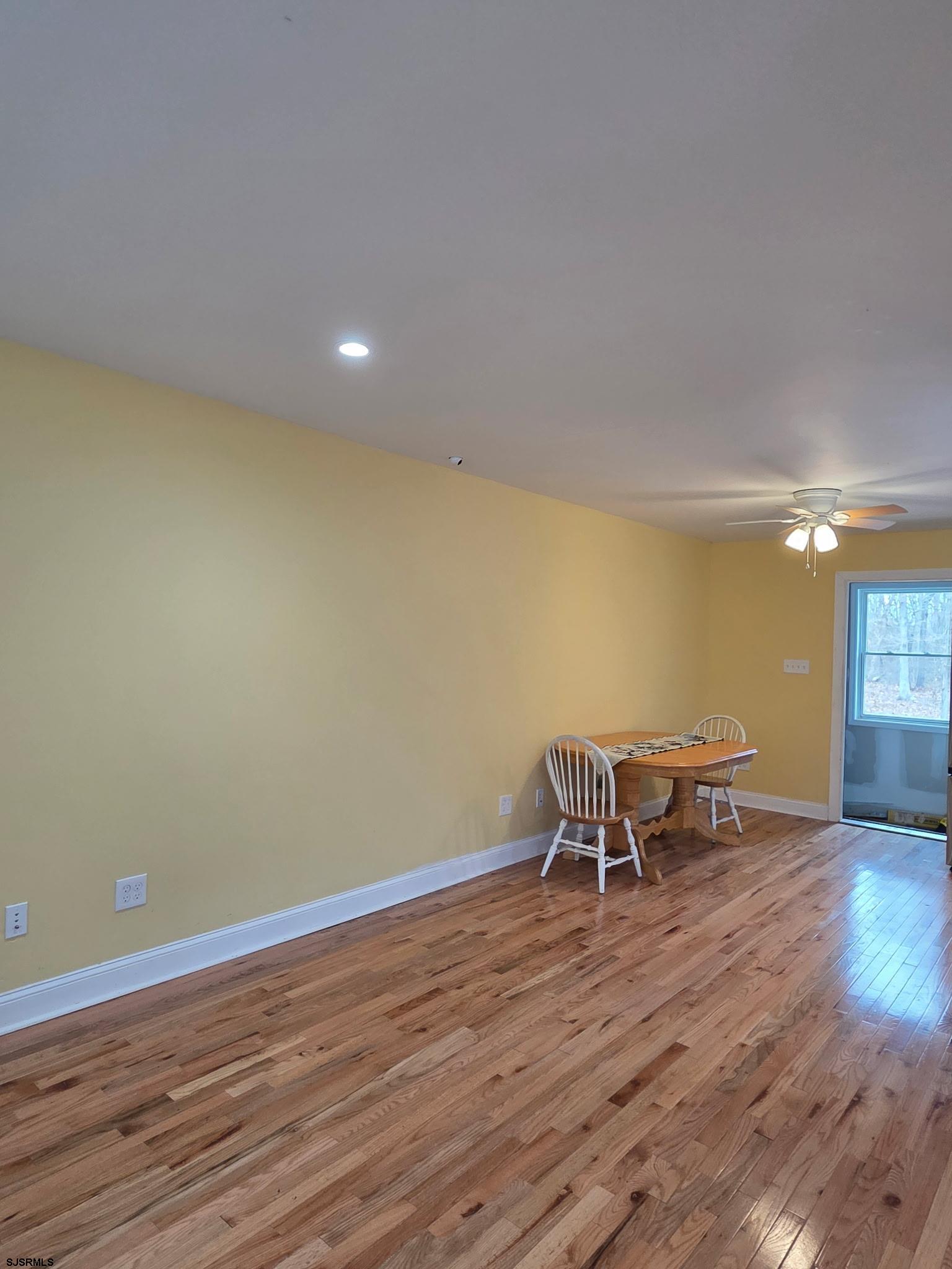 131 Jones Kane Road Williamstown, NJ 08094 - Photo 7 of 18 a view of a room with wooden floor and lounge chair