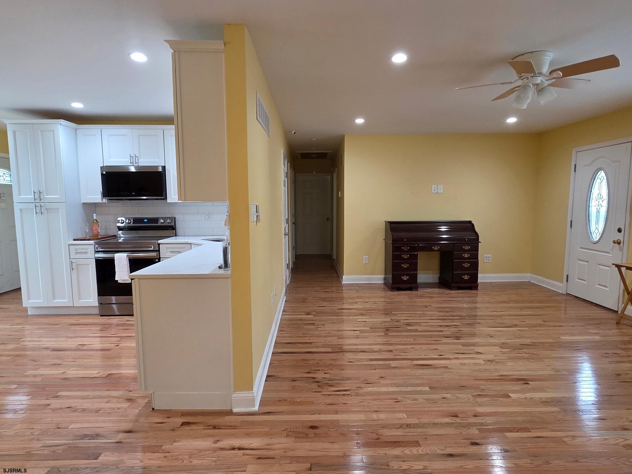 131 Jones Kane Road Williamstown, NJ 08094 - Photo 9 of 18 a view of kitchen with kitchen island microwave and stove