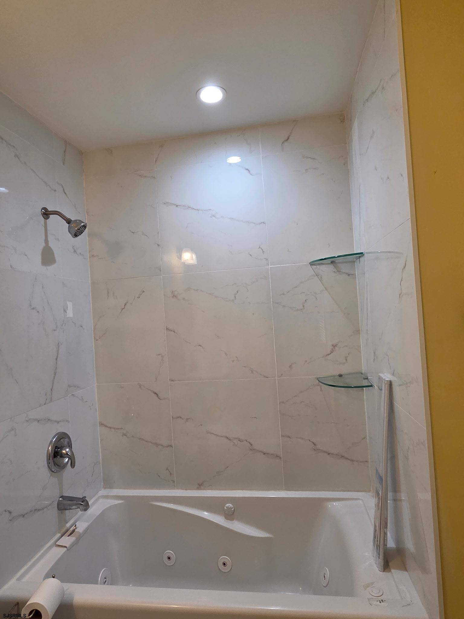 131 Jones Kane Road Williamstown, NJ 08094 - Photo 10 of 18 a bathroom with a shower and bathtub
