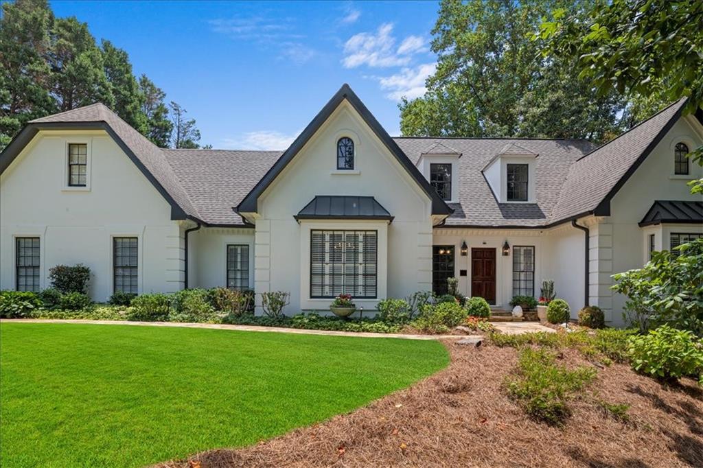 4046 River Ridge Chase Marietta, GA 30067 - Photo 1 of 1 a front view of house with yard and green space