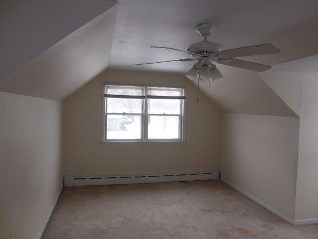 901 South Westgate Road Des Plaines, IL 60016 - Photo 17 of 21 an empty room with a window and a fan
