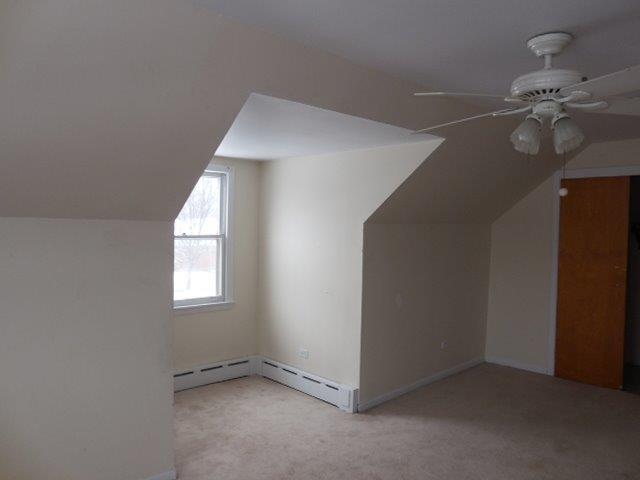 901 South Westgate Road Des Plaines, IL 60016 - Photo 18 of 21 an empty room with chandelier fan and windows