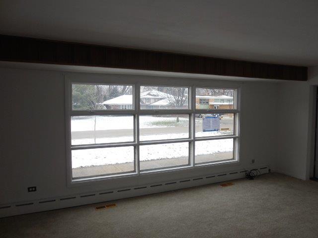 901 South Westgate Road Des Plaines, IL 60016 - Photo 6 of 21 a view of an empty room with a window