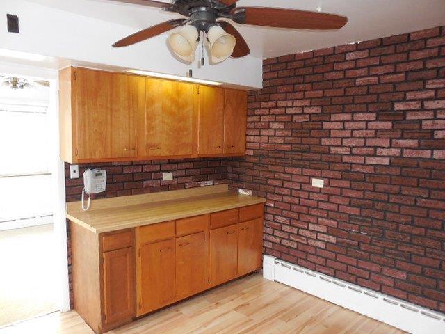 901 South Westgate Road Des Plaines, IL 60016 - Photo 10 of 21 a bathroom with a sink and a mirror