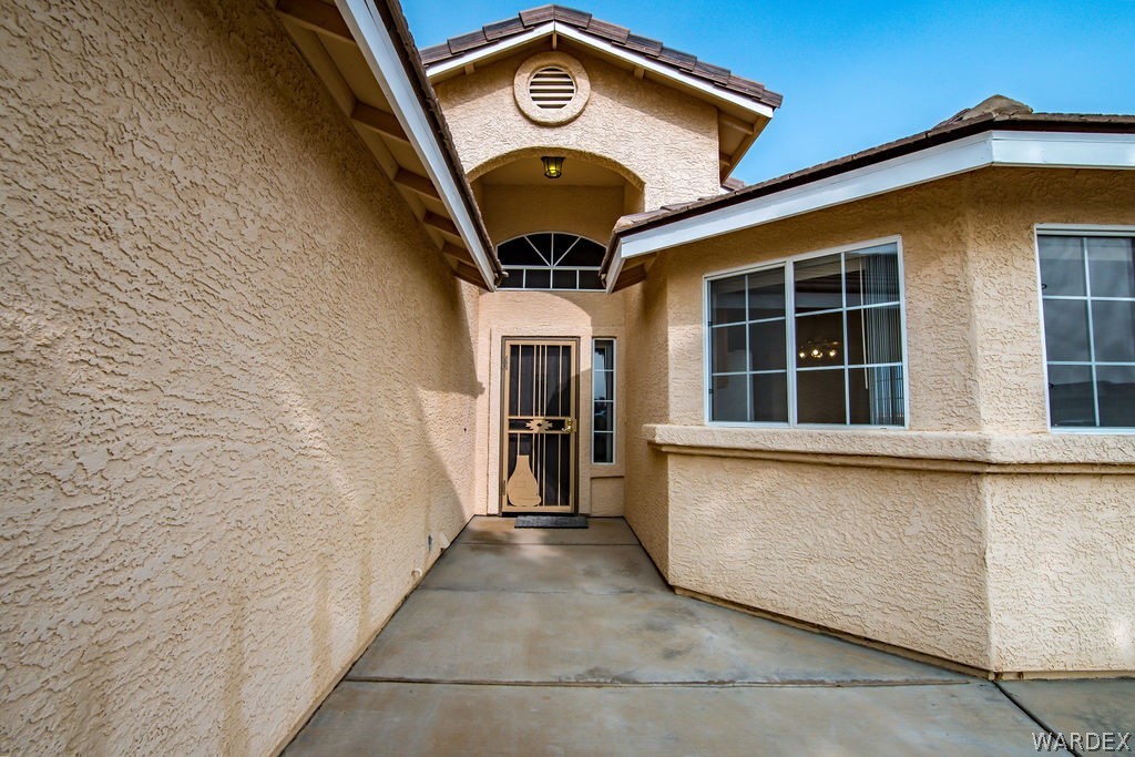 4213 East Cane Ranch Road Kingman, AZ 86401 - Photo 23 of 40 a view of a entryway door of the house