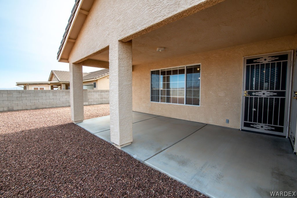 4213 East Cane Ranch Road Kingman, AZ 86401 - Photo 25 of 40 a view of an empty room with floor to ceiling window