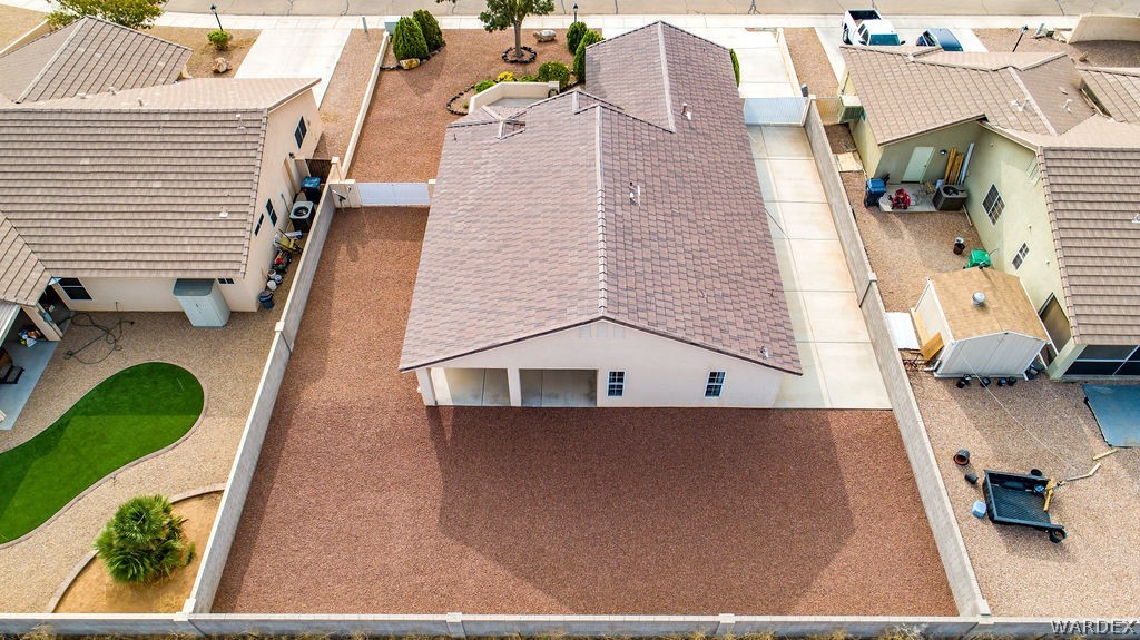 4213 East Cane Ranch Road Kingman, AZ 86401 - Photo 31 of 40 an aerial view of a house with a yard