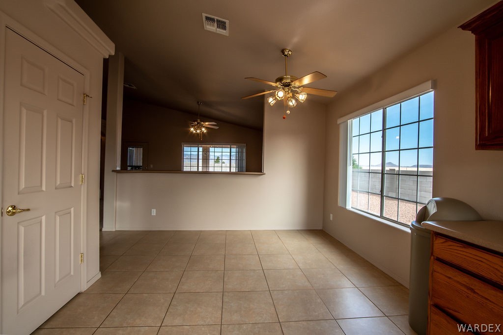 4213 East Cane Ranch Road Kingman, AZ 86401 - Photo 6 of 40 a view of an empty room with a window