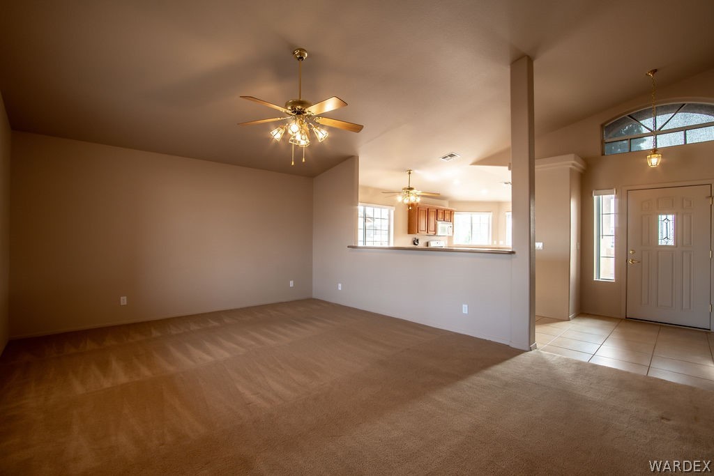 4213 East Cane Ranch Road Kingman, AZ 86401 - Photo 9 of 40 a view of an empty room with a window