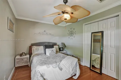 a bedroom with a bed and a table in it