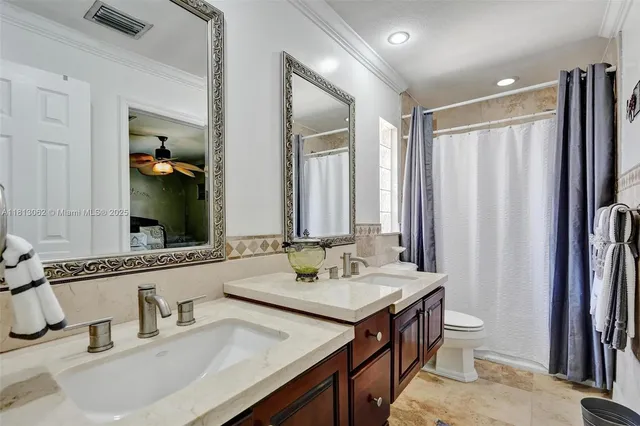 $694,900 | 8438 Northwest 26th Drive, Coral Springs, FL 33065