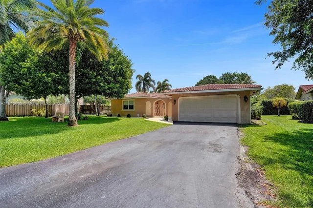 $694,900 | 8438 Northwest 26th Drive, Coral Springs, FL 33065