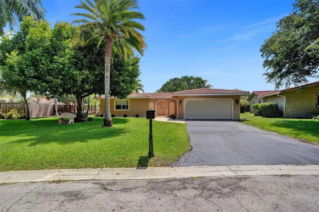 $694,900 | 8438 Northwest 26th Drive, Coral Springs, FL 33065