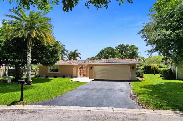 $694,900 | 8438 Northwest 26th Drive, Coral Springs, FL 33065
