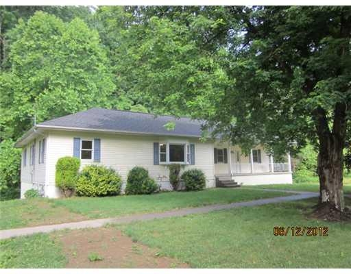 377 Smithcreek Road Spraggs, PA 15362 - Photo 1 of 13 Exterior Front. 5 ACRES IN COUNTRY LOCATION WITH YOUR OWN POND - No steps in this lovely rancher - EVERYTHING on one level!!