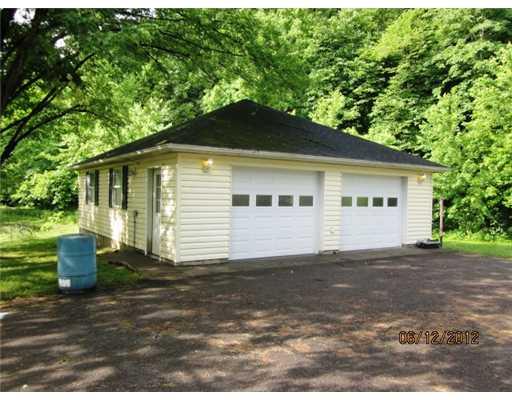 377 Smithcreek Road Spraggs, PA 15362 - Photo 3 of 13 Parking Lot/Garage. 2 car detached garage with blacktop driveway and lots of room for workshop area too!
