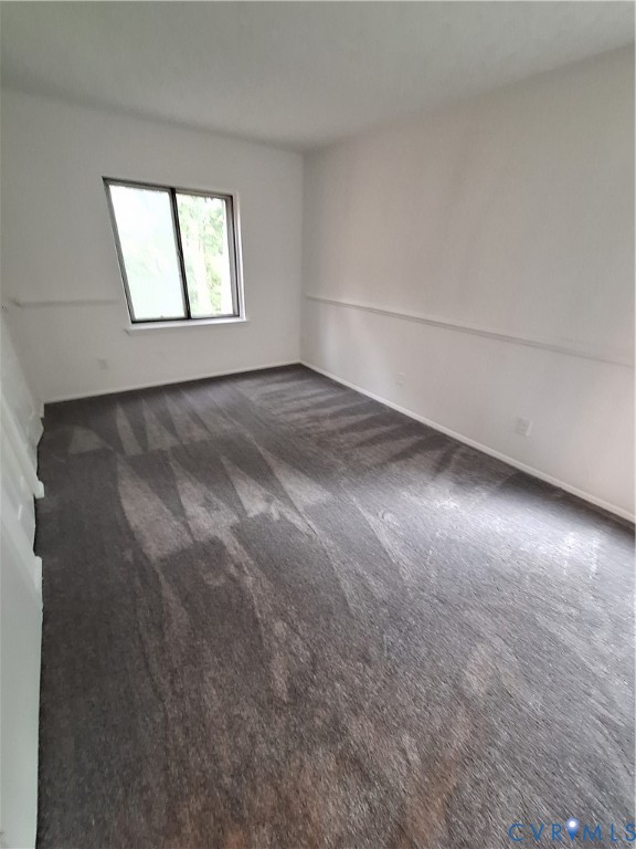 1501 Regency Woods Road, Unit 303 Henrico, VA 23238 - Photo 15 of 24 an empty room with windows