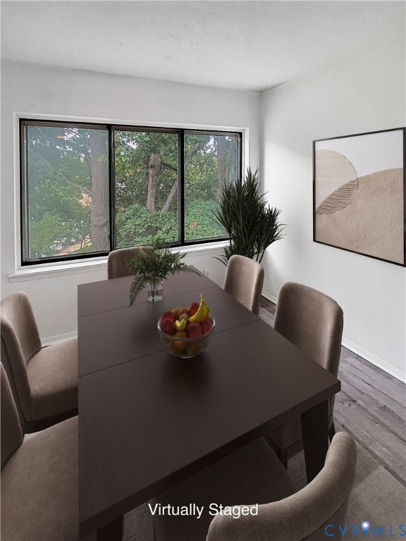 1501 Regency Woods Road, Unit 303 Henrico, VA 23238 - Photo 2 of 24 a view of a dining room with furniture window and outside view