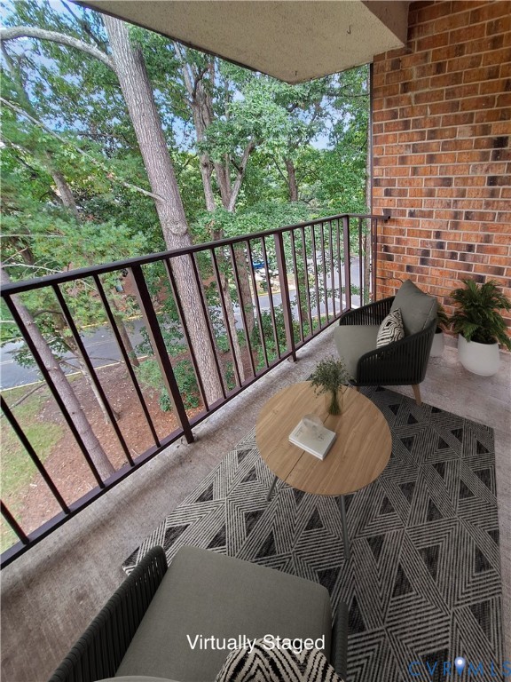 1501 Regency Woods Road, Unit 303 Henrico, VA 23238 - Photo 6 of 24 a view of a balcony with furniture