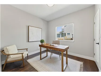 a workspace with furniture and window