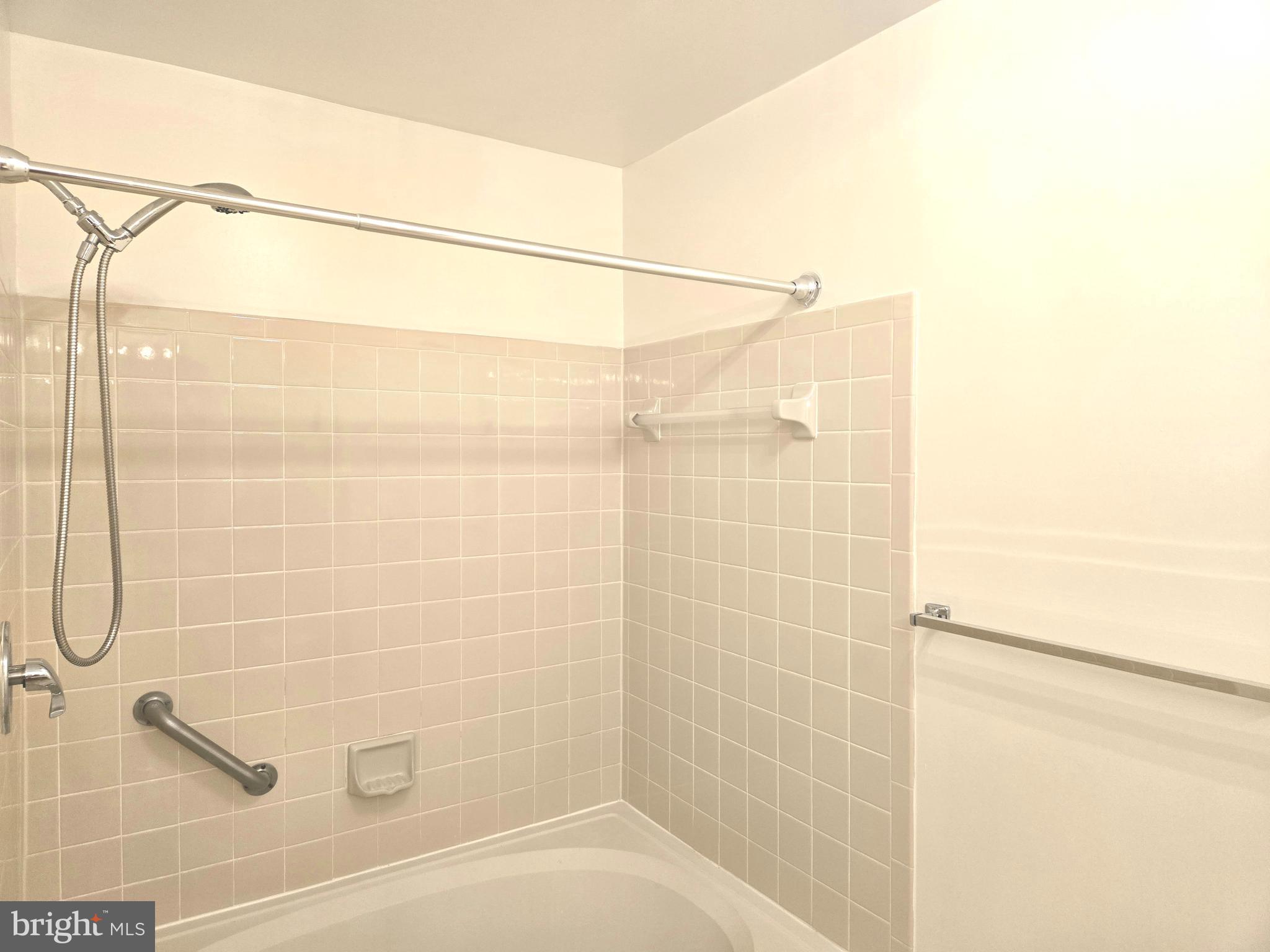 1537 Church Hill Place, Unit 1537 Reston, VA 20194 - Photo 13 of 40 a bathroom with a shower
