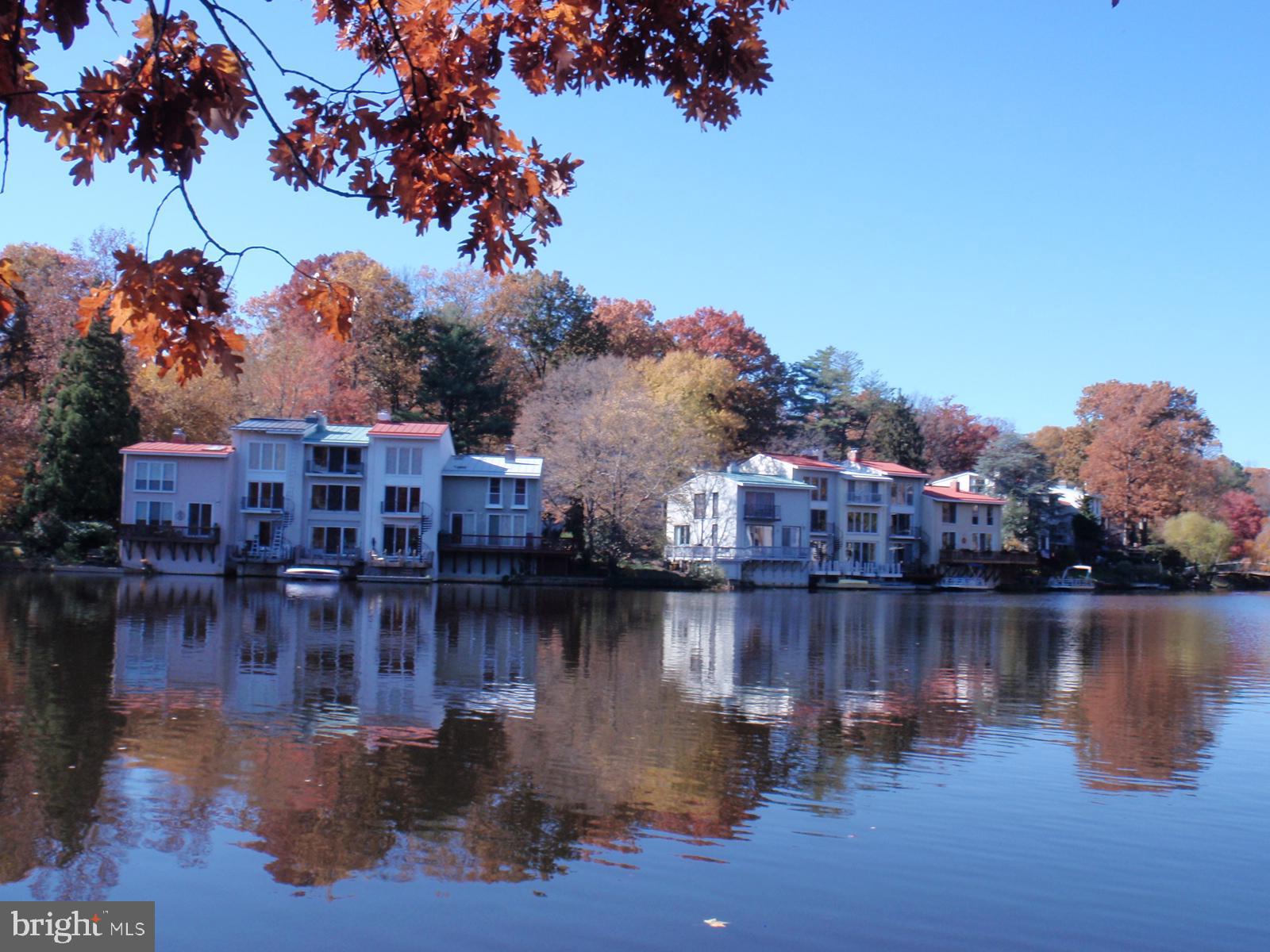 1537 Church Hill Place, Unit 1537 Reston, VA 20194 - Photo 35 of 40 a view of a lake with houses