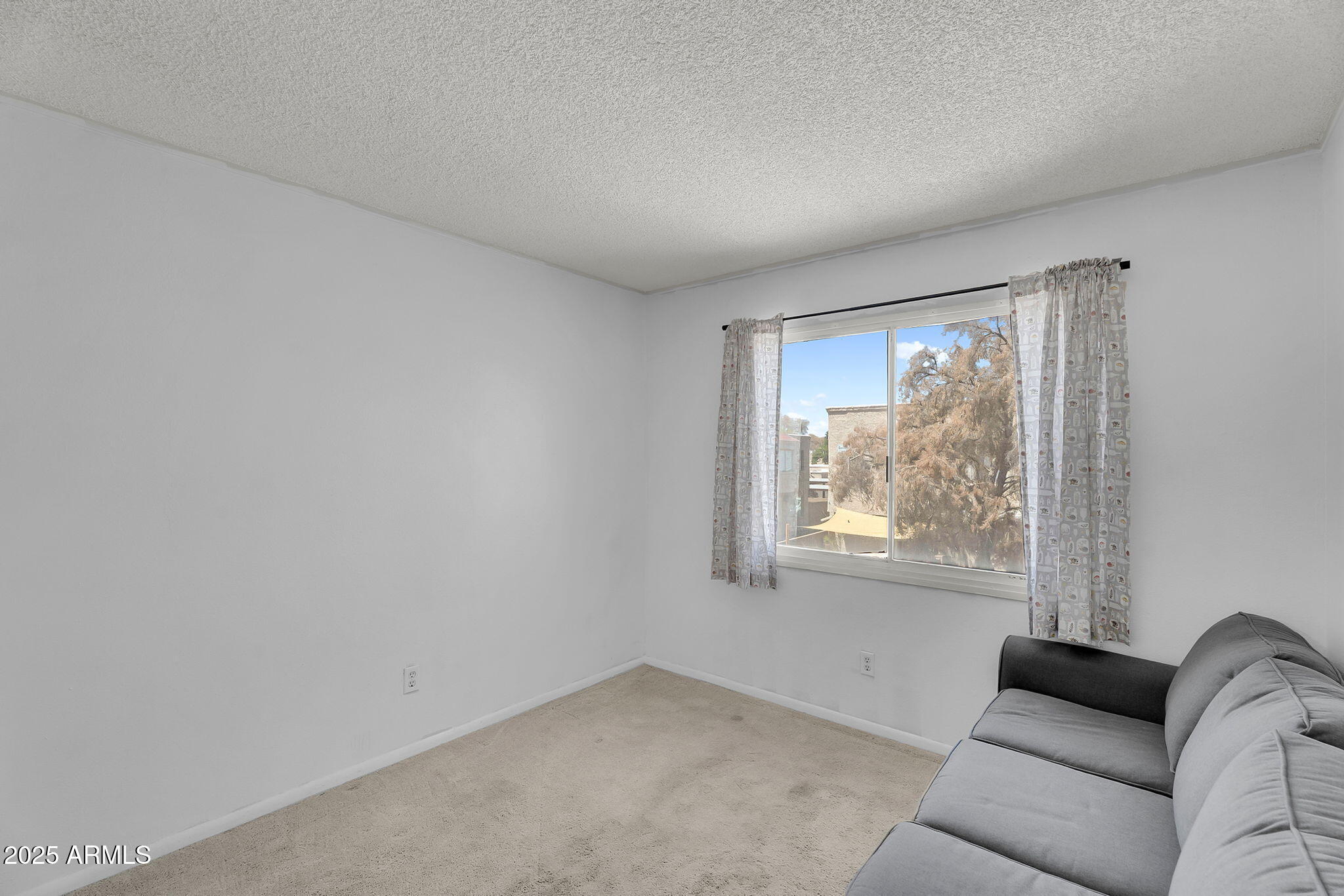 600 South Dobson Road, Unit 6 Mesa, AZ 85202 - Photo 14 of 21 a living room with furniture and a window