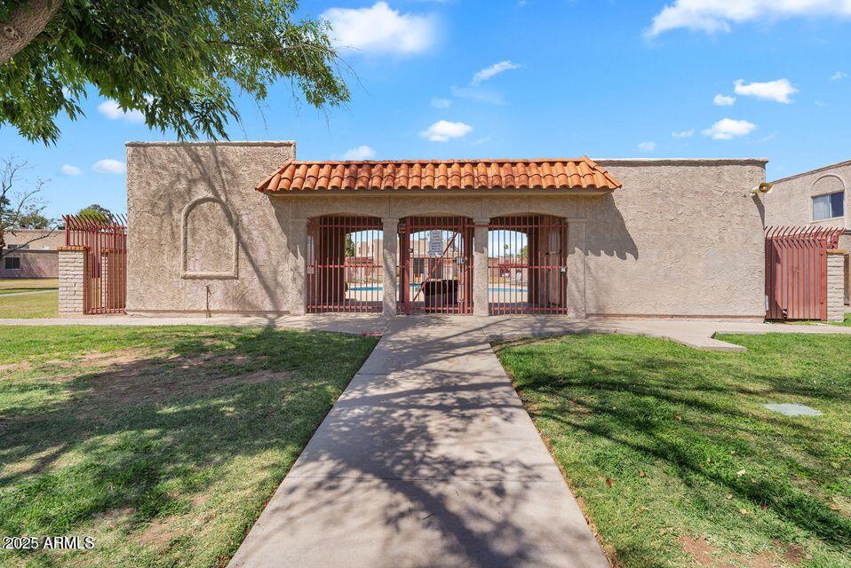 600 South Dobson Road, Unit 6 Mesa, AZ 85202 - Photo 18 of 21 a view of a garden with a pathway