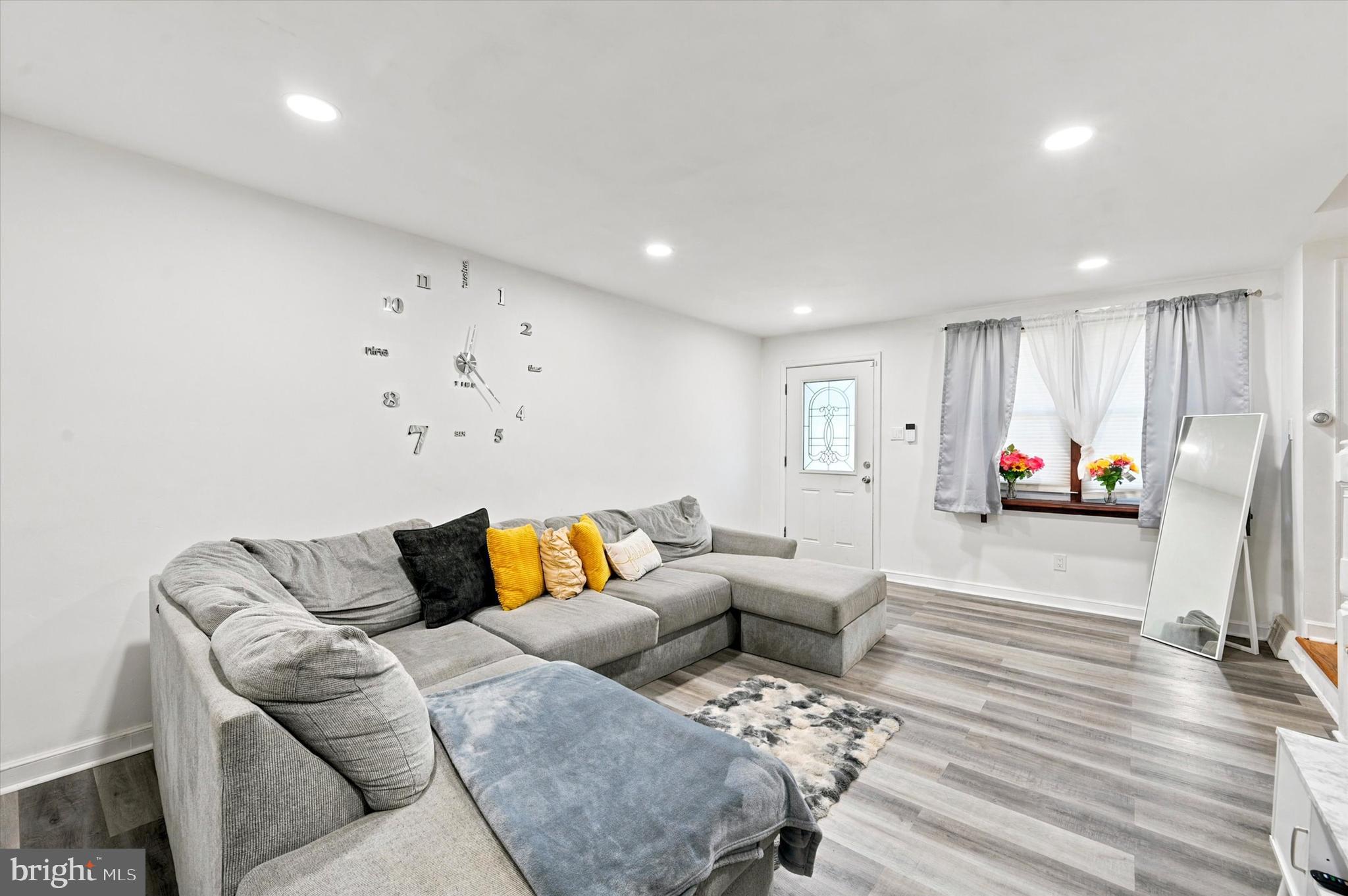268 Blanchard Road Drexel Hill, PA 19026 - Photo 3 of 15 a living room with furniture and a flat screen tv