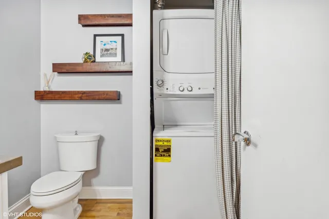 a bathroom with a toilet and a sink