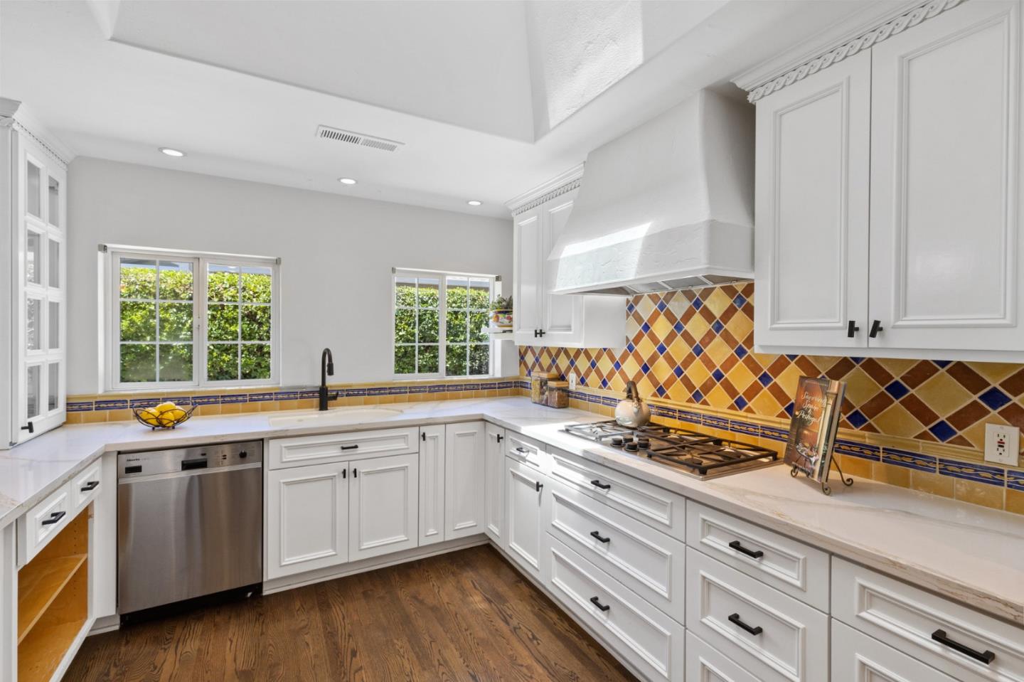 1205 Fewtrell Drive Campbell, CA 95008 - Photo 12 of 52 a kitchen with stainless steel appliances granite countertop a sink and cabinets with wooden floor