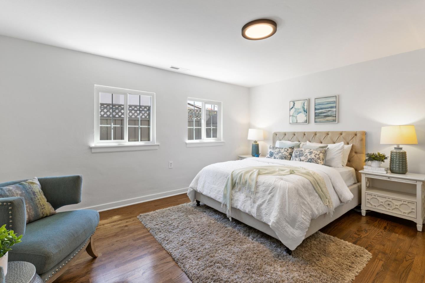 1205 Fewtrell Drive Campbell, CA 95008 - Photo 16 of 52 a bedroom with a bed and a lamp