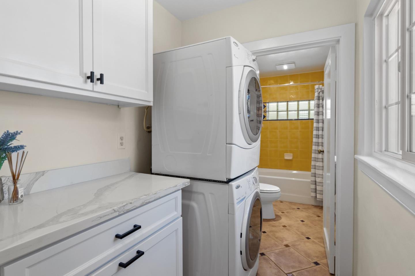 1205 Fewtrell Drive Campbell, CA 95008 - Photo 22 of 52 a bathroom with a granite countertop sink and a mirror