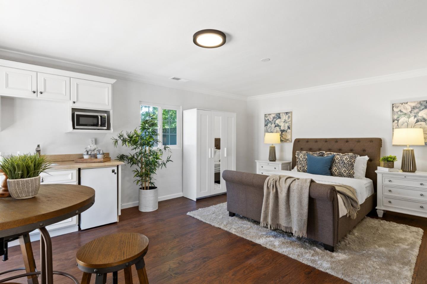 1205 Fewtrell Drive Campbell, CA 95008 - Photo 29 of 52 a living room with furniture potted plant and a table